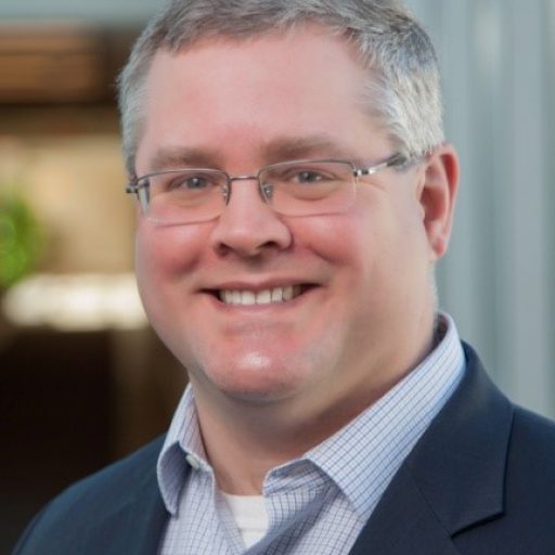 Professional headshot of Board member Jason Frei